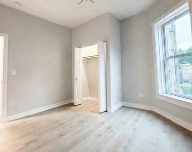 6039 S Eberhart Avenue - Photo Thumbnail 11