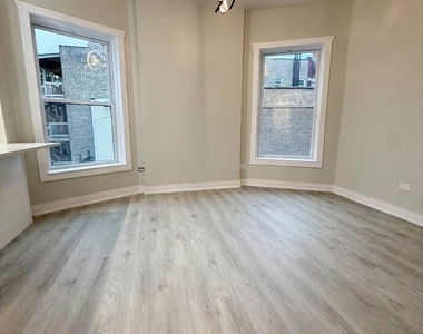 6039 S Eberhart Avenue - Photo Thumbnail 4