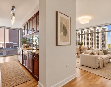 100 E 14th Street - Photo Thumbnail 3