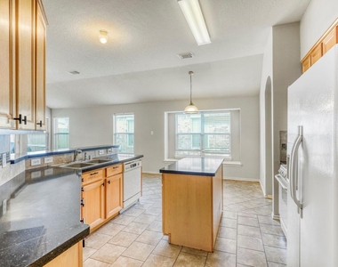 7311 Cragmont Bridge Drive - Photo Thumbnail 10