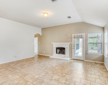 7311 Cragmont Bridge Drive - Photo Thumbnail 4