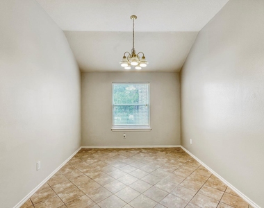 7311 Cragmont Bridge Drive - Photo Thumbnail 2