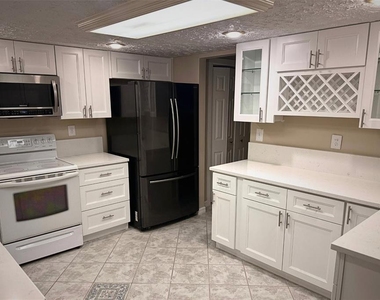 8748 Forest Lake Drive - Photo Thumbnail 3
