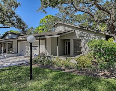 4799 Oak Forest Drive W - Photo Thumbnail 3