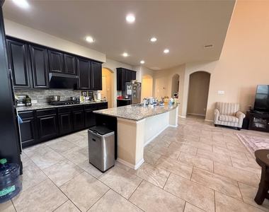 9903 Daisy Clover Court - Photo Thumbnail 9