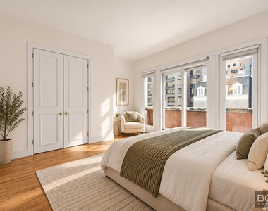 East 57 Avenue - Photo Thumbnail 2