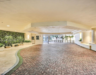 99 Se Mizner Boulevard - Photo Thumbnail 3