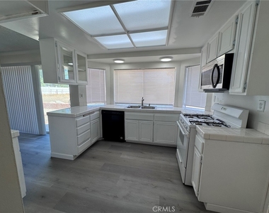 15730 Alvarado Street - Photo Thumbnail 5