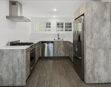 1105 Alta Loma Road - Photo Thumbnail 1