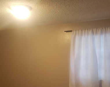 8015 Patou Drive N - Photo Thumbnail 9