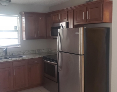 8015 Patou Drive N - Photo Thumbnail 7