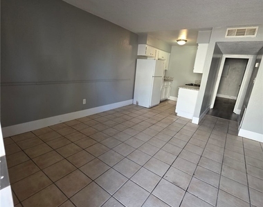 1075 E Desert Inn Road - Photo Thumbnail 1