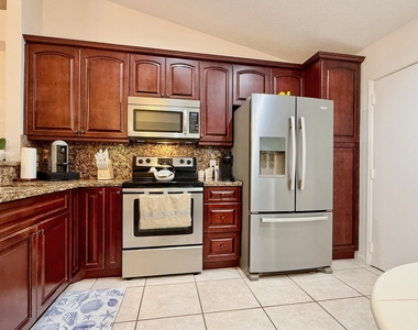 10938 Roebelini Palm Court - Photo Thumbnail 7