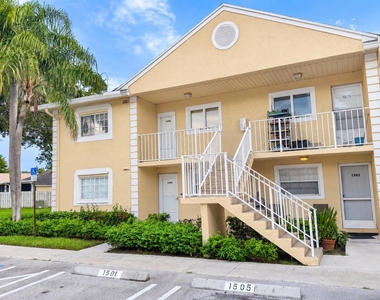 1505 Palm Beach Trace Drive - Photo Thumbnail 1