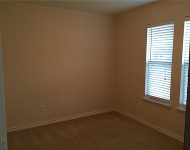 6908 Planters Row Drive - Photo Thumbnail 1