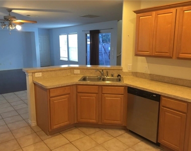 6908 Planters Row Drive - Photo Thumbnail 5