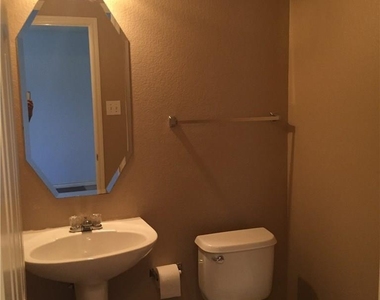 6908 Planters Row Drive - Photo Thumbnail 9