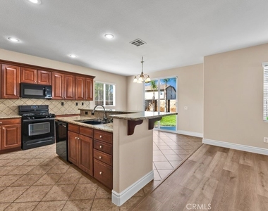 7447 Larsen Bay Street - Photo Thumbnail 3