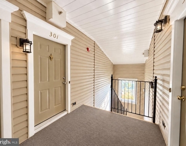 46924 Courtyard Square - Photo Thumbnail 1