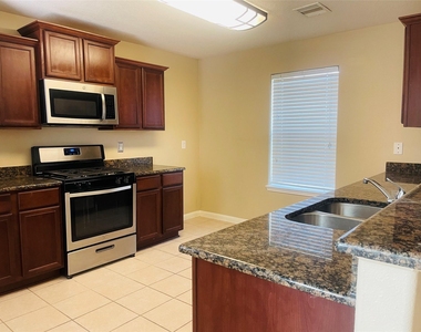 9434 Turquoise Meadow Lane - Photo Thumbnail 6