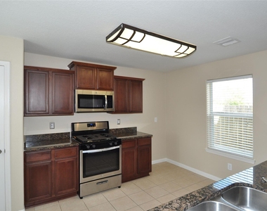 9434 Turquoise Meadow Lane - Photo Thumbnail 7