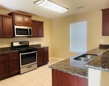 9434 Turquoise Meadow Lane - Photo Thumbnail 5