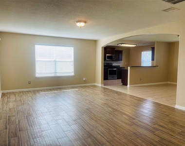 9434 Turquoise Meadow Lane - Photo Thumbnail 3