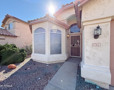 9765 W Yukon Drive - Photo Thumbnail 3