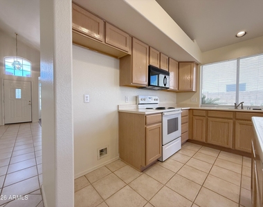 9765 W Yukon Drive - Photo Thumbnail 8
