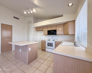 9765 W Yukon Drive - Photo Thumbnail 9