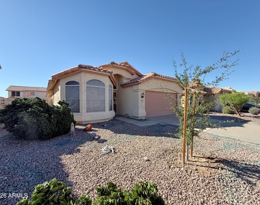 9765 W Yukon Drive - Photo Thumbnail 2