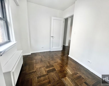 East 35 Street - Photo Thumbnail 8
