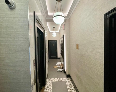 E 81st St - Photo Thumbnail 10
