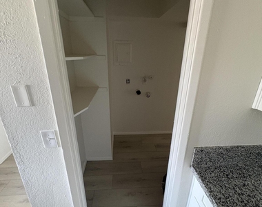 1207 E Jarvis Avenue - Photo Thumbnail 3