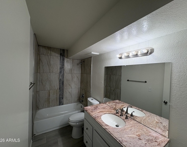 1207 E Jarvis Avenue - Photo Thumbnail 10
