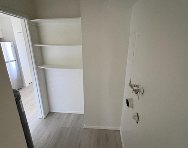 1207 E Jarvis Avenue - Photo Thumbnail 4