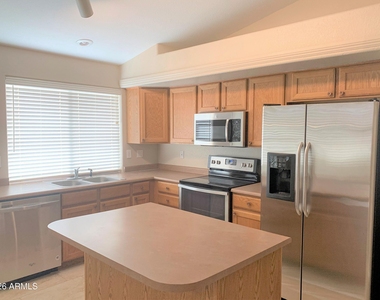 1723 E Erie Street - Photo Thumbnail 3