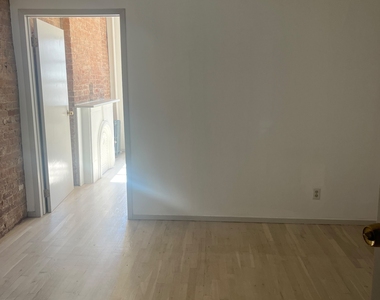 406 West 48th Street - Photo Thumbnail 1