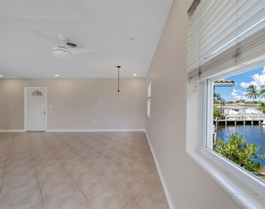 2591 Ne 55th Court - Photo Thumbnail 3