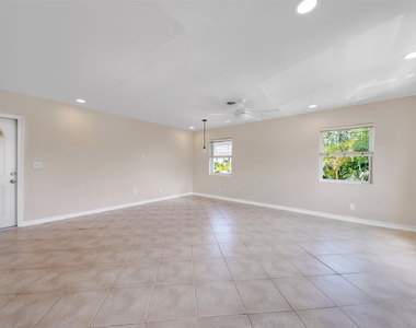 2591 Ne 55th Court - Photo Thumbnail 1