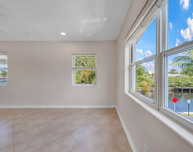 2591 Ne 55th Court - Photo Thumbnail 2