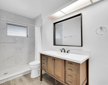 1050 E Sample Road - Photo Thumbnail 9