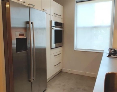 82-16 34th Avenue - Photo Thumbnail 1