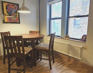 82-16 34th Avenue - Photo Thumbnail 4
