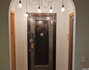 82-16 34th Avenue - Photo Thumbnail 2
