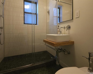 82-16 34th Avenue - Photo Thumbnail 7