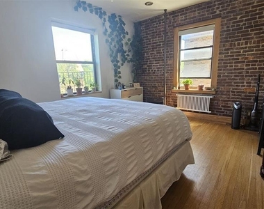 82-16 34th Avenue - Photo Thumbnail 5