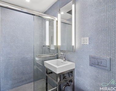 221 E 10th Street - Photo Thumbnail 4
