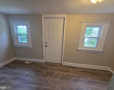119 W Washington Street - Photo Thumbnail 6