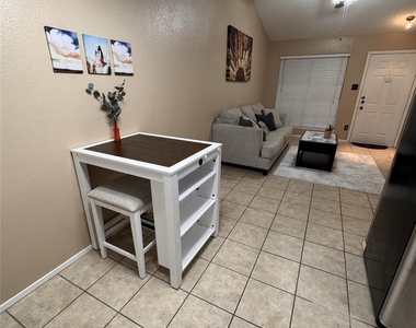 1015 E Yager Ln - Photo Thumbnail 4